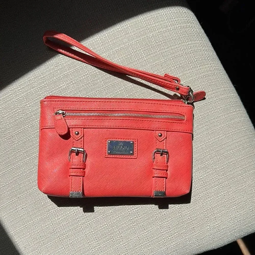 Nicole by Nicole Miller salmon colored Wristlet with Gold Details